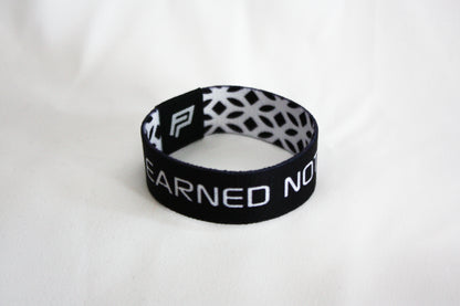 "EARNED NOT GIVEN" Wristband